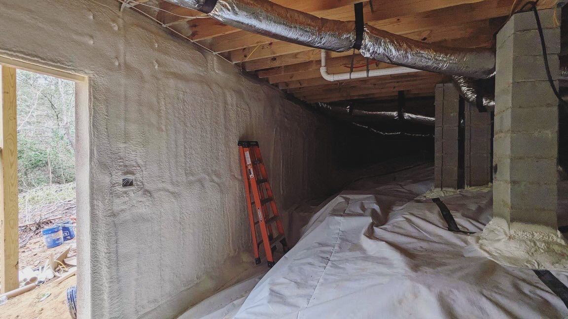 There is a ladder in the corner of the room.