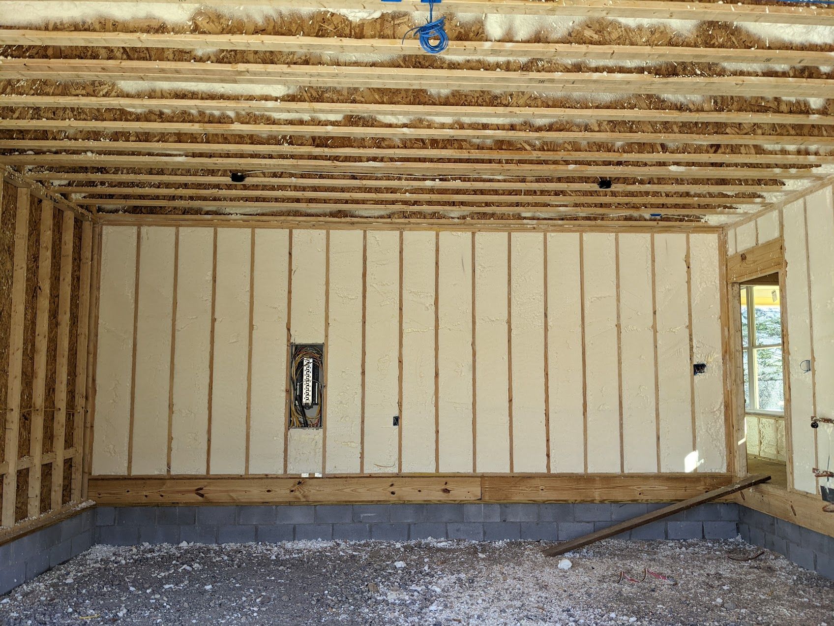 A room with a lot of insulation on the walls and ceiling.