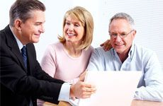 Senior couple with financial adviser