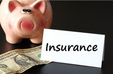 Insurance concept with piggy bank and money on black background