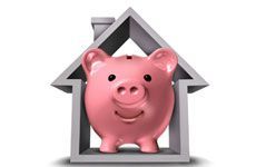 Picture of a piggy bank inside a house