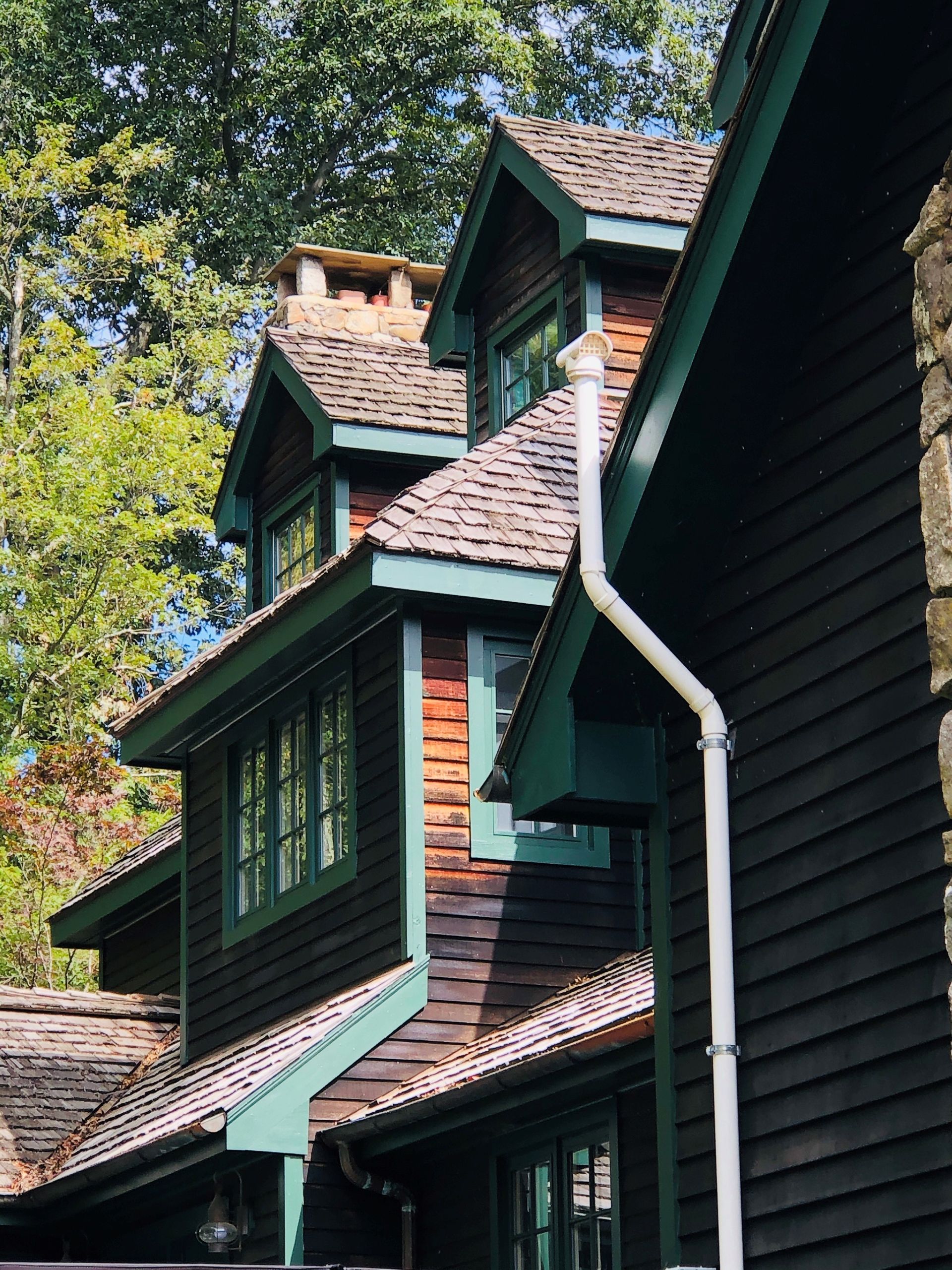 A house with a gutter on the side of it