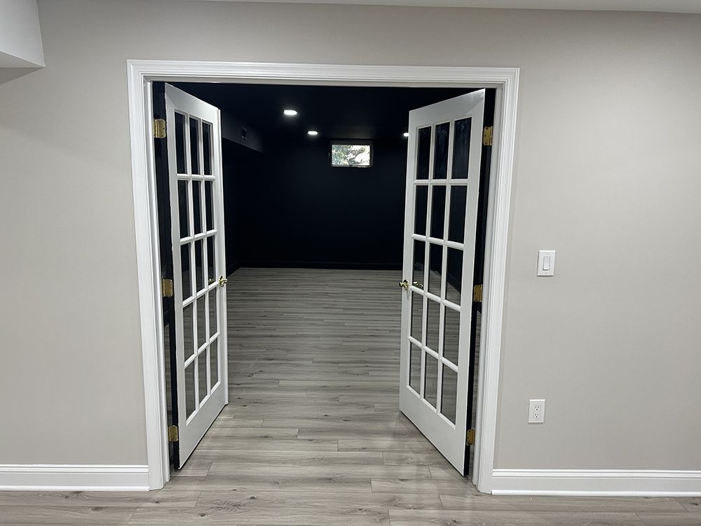 The doors are open and leading to a dark room.