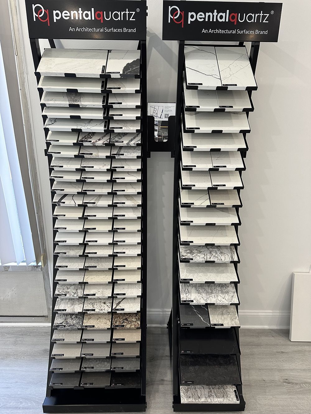 Two display racks filled with different types of quartz.