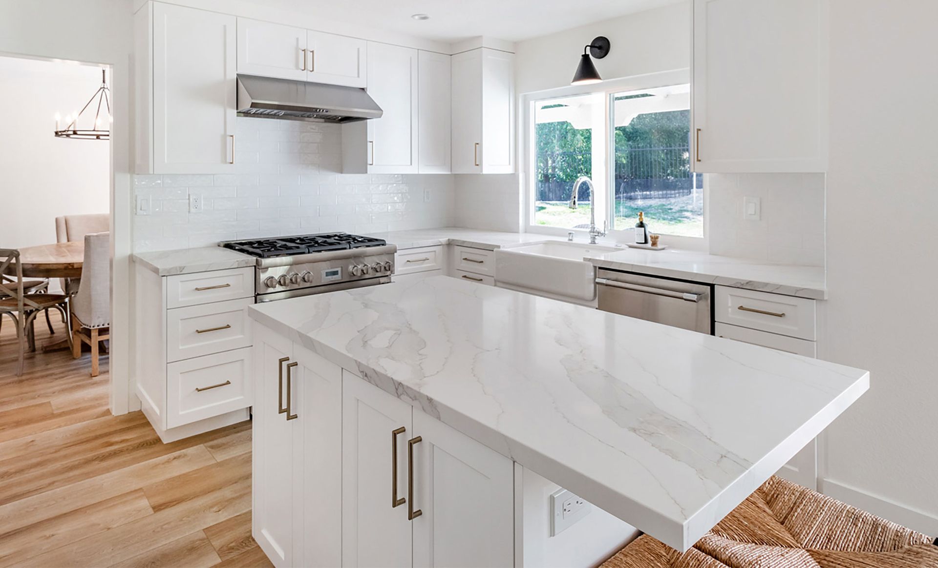 There is a large island in the middle of the kitchen.