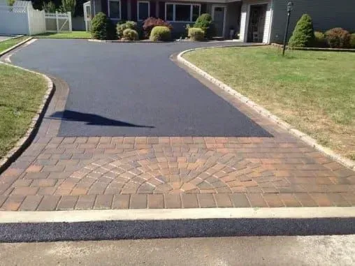 Newly paved asphalt driveway.