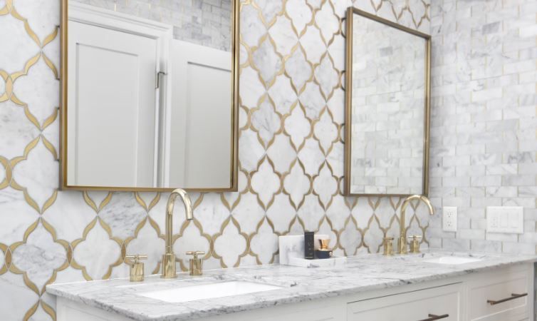 A bathroom with two sinks and two mirrors.