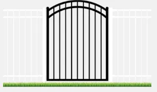 Black arched gate between white picket fences, on green grass.