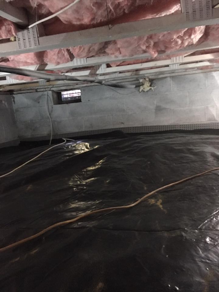 It looks like a flooded basement with a lot of water coming out of it.