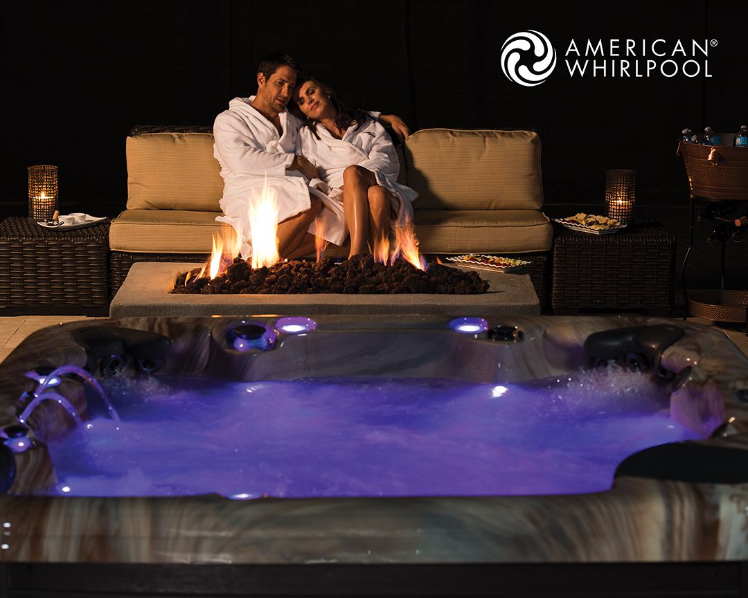 hot tub with two people in robes