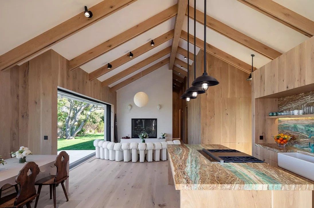 A kitchen with lighting fixtures in the morning