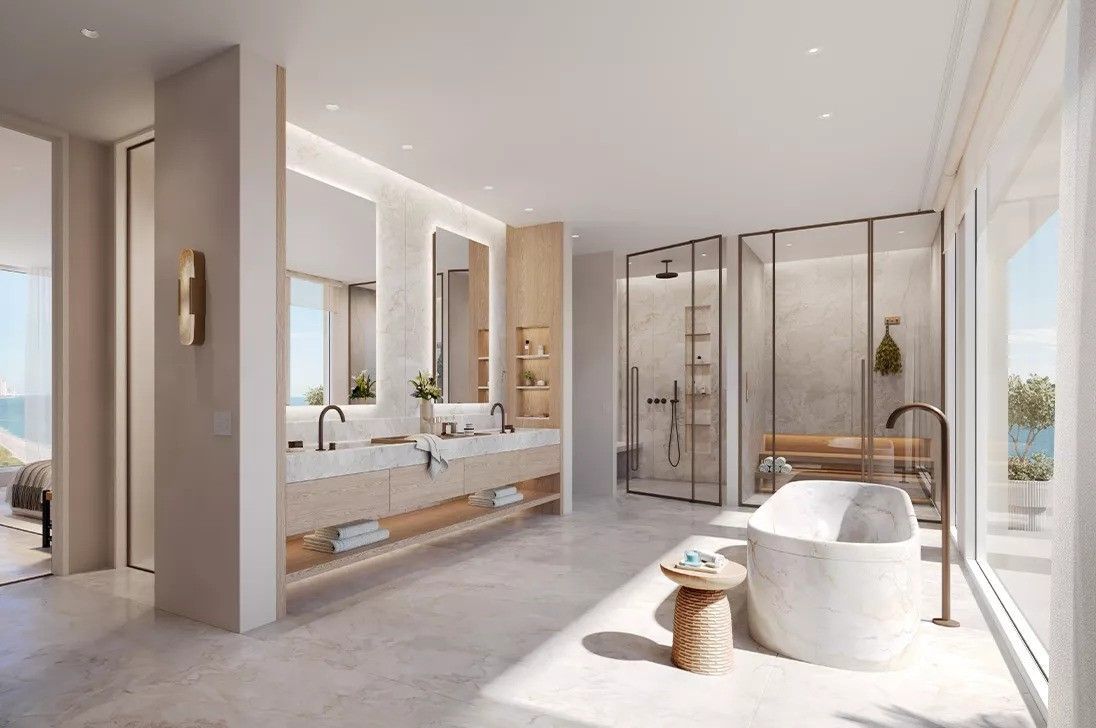 Bathroom with a bathtub and two sinks
