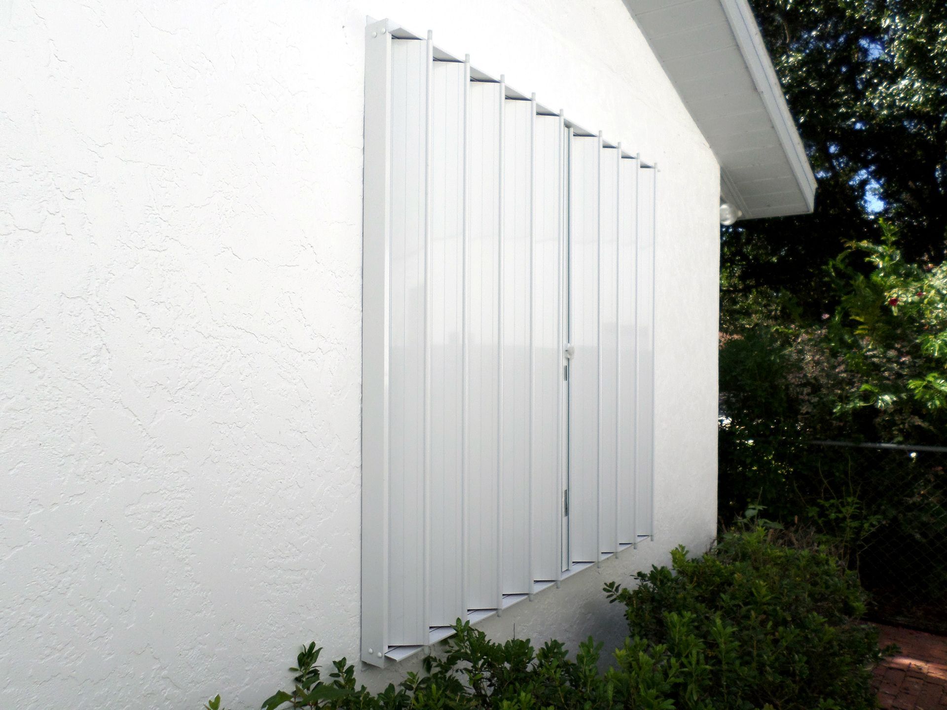 White accordion shutter
