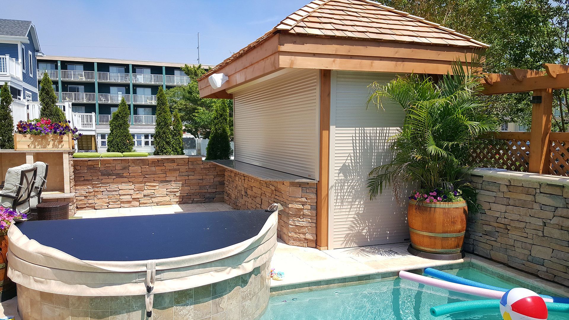 Pool bar with shutters