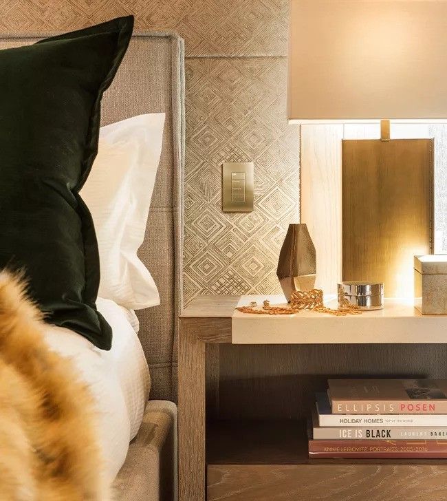 A bed next to a nightstand