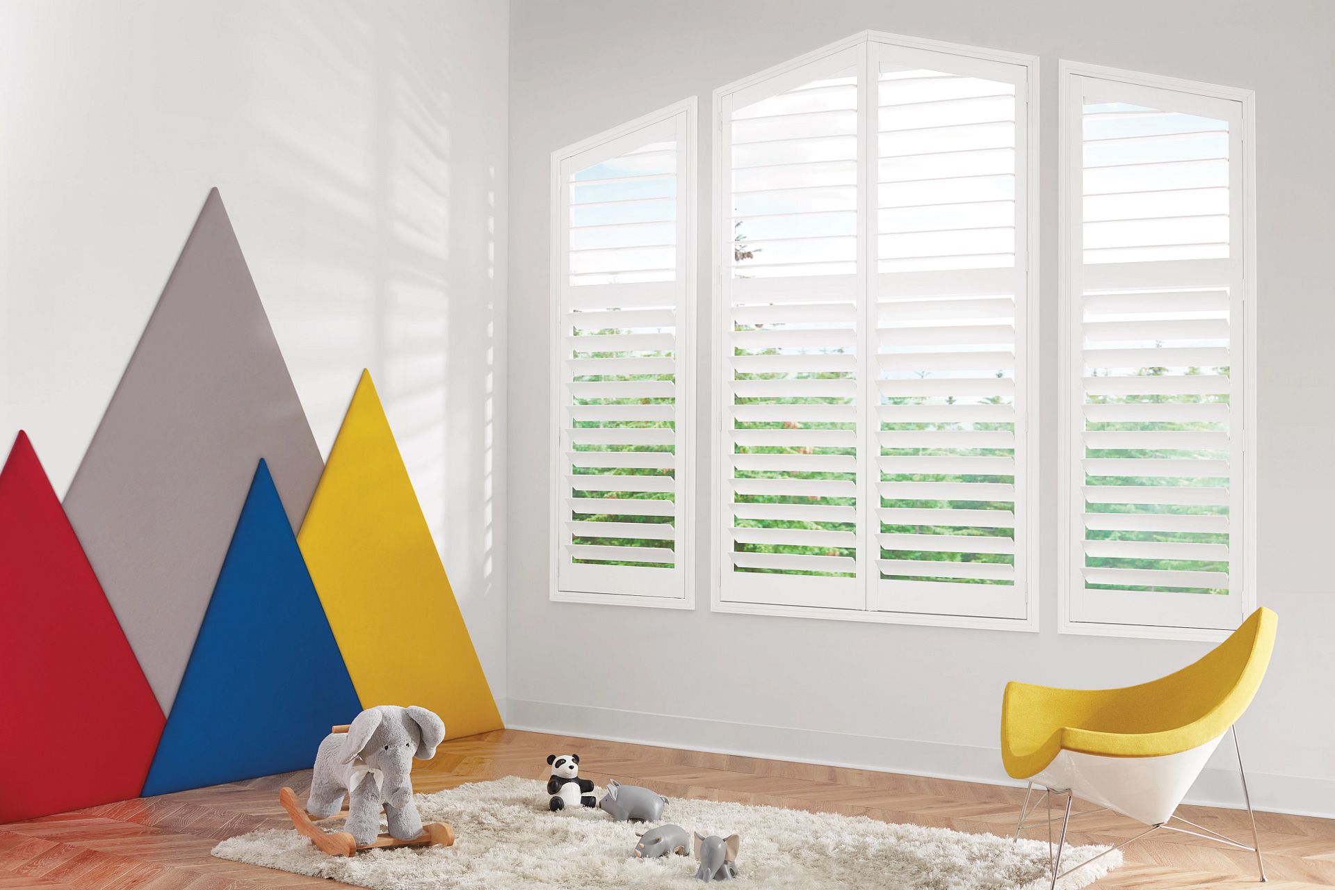 White interior shutters in a sunlit room