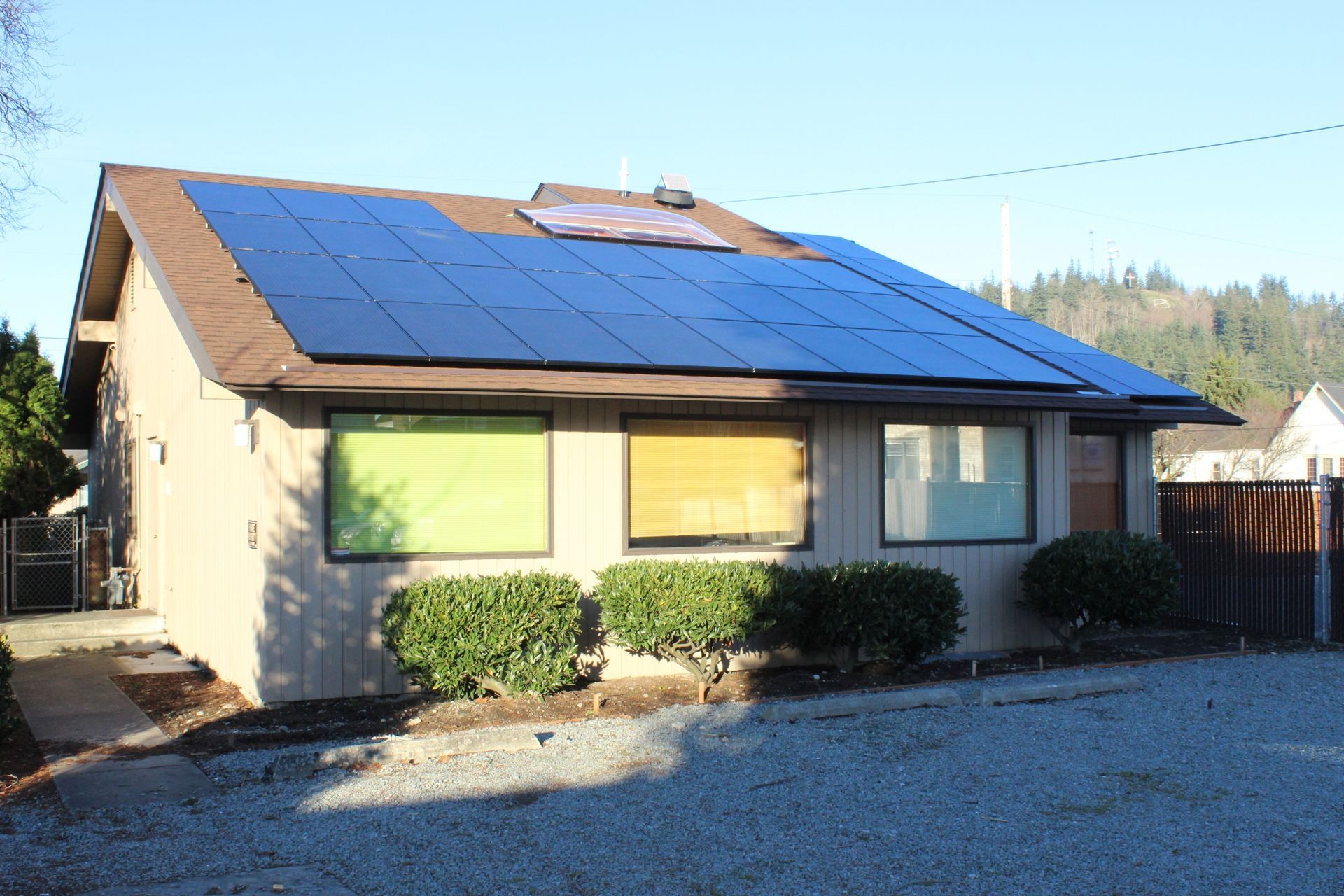 a house with a lot of solar panels on the roof