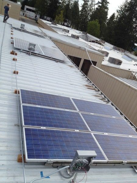 a roof with a lot of solar panels on it