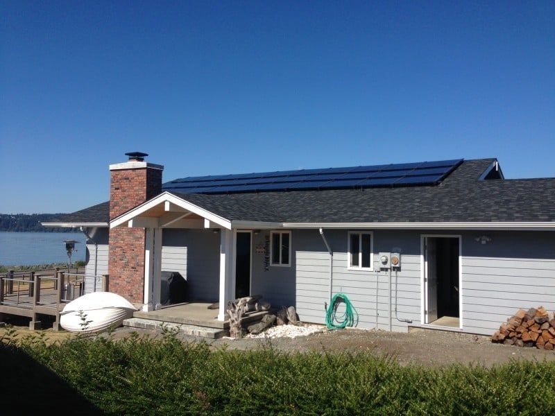 a house with solar panels on the roof