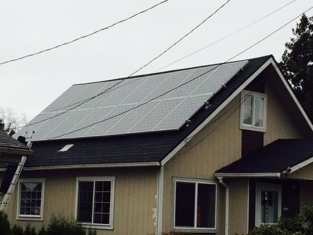 a house with solar panels on the roof
