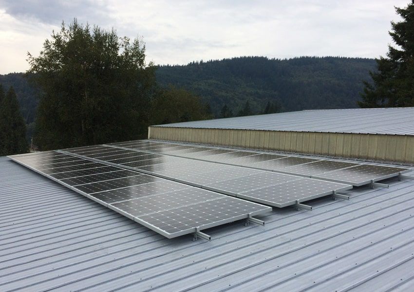 a roof with a lot of solar panels on it