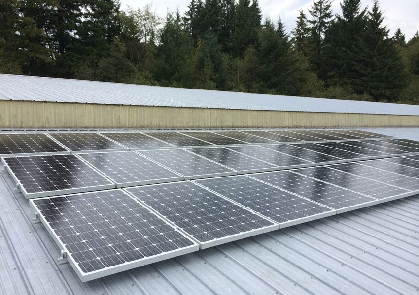 a roof with a lot of solar panels on it