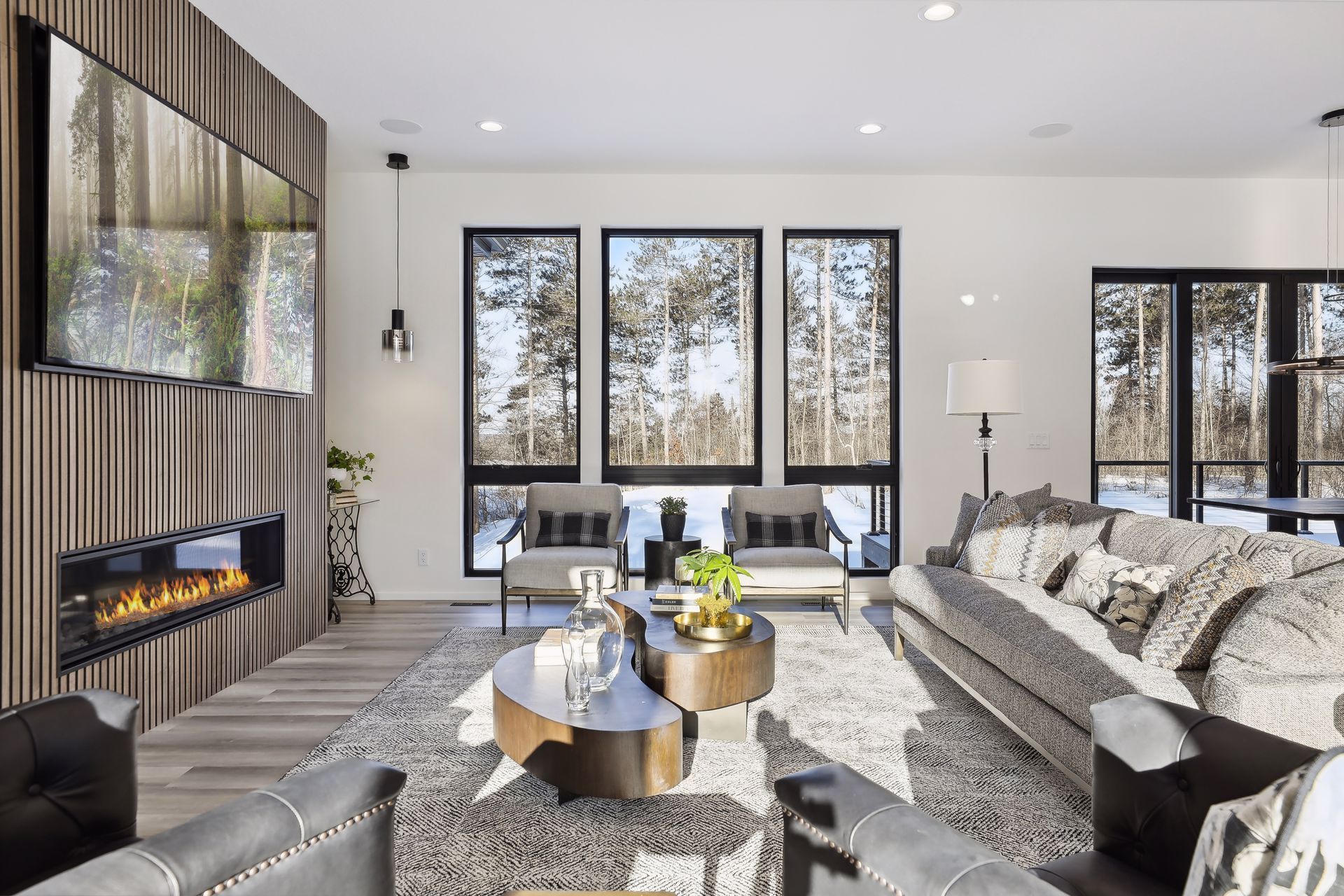 A living room filled with furniture and a fireplace.