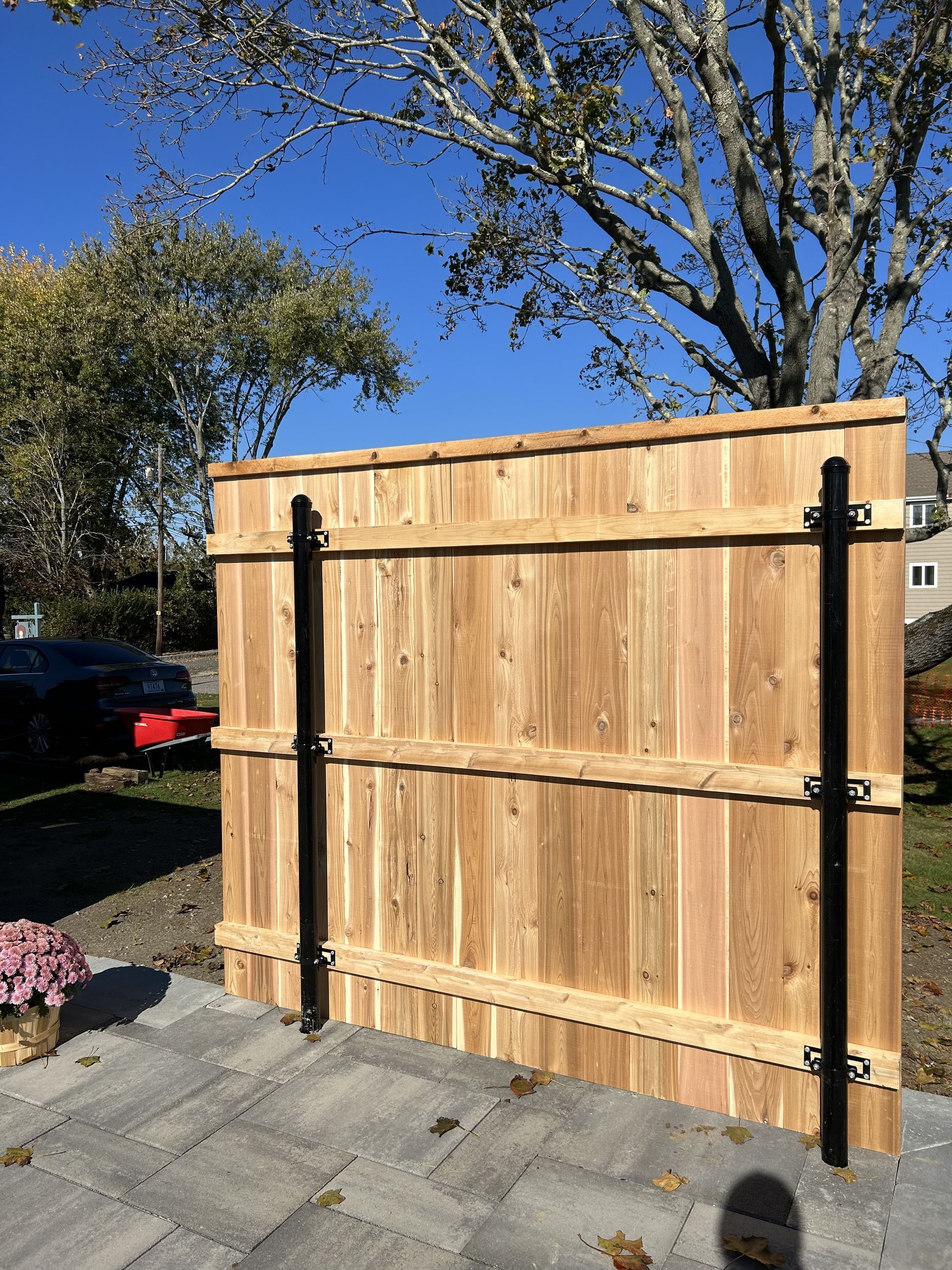 Flat board on black pipe