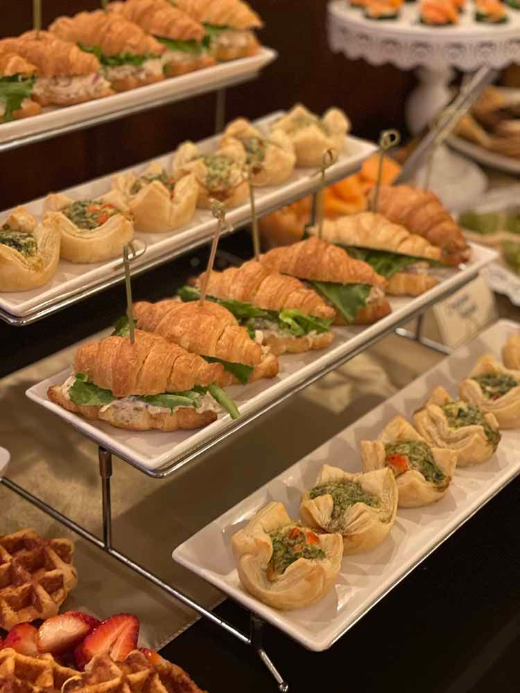 there are many different types of food on the plates on the table