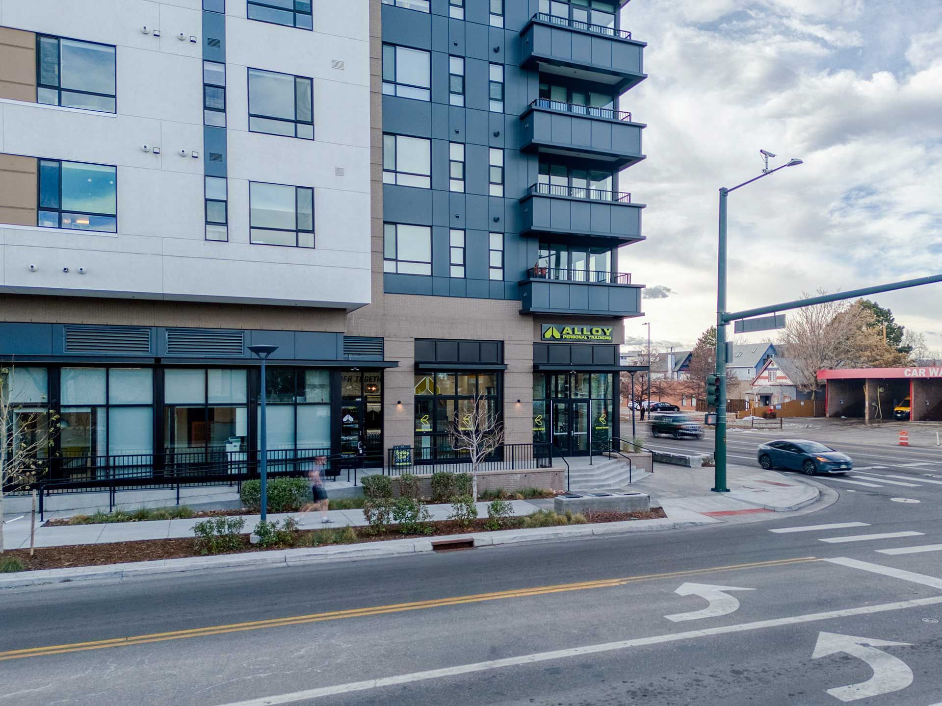 modern buildings with storefronts along a city street
