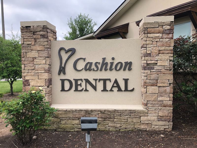 A sign that says cashion dental on it