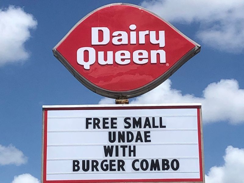 A dairy queen sign that says free small undae with burger combo