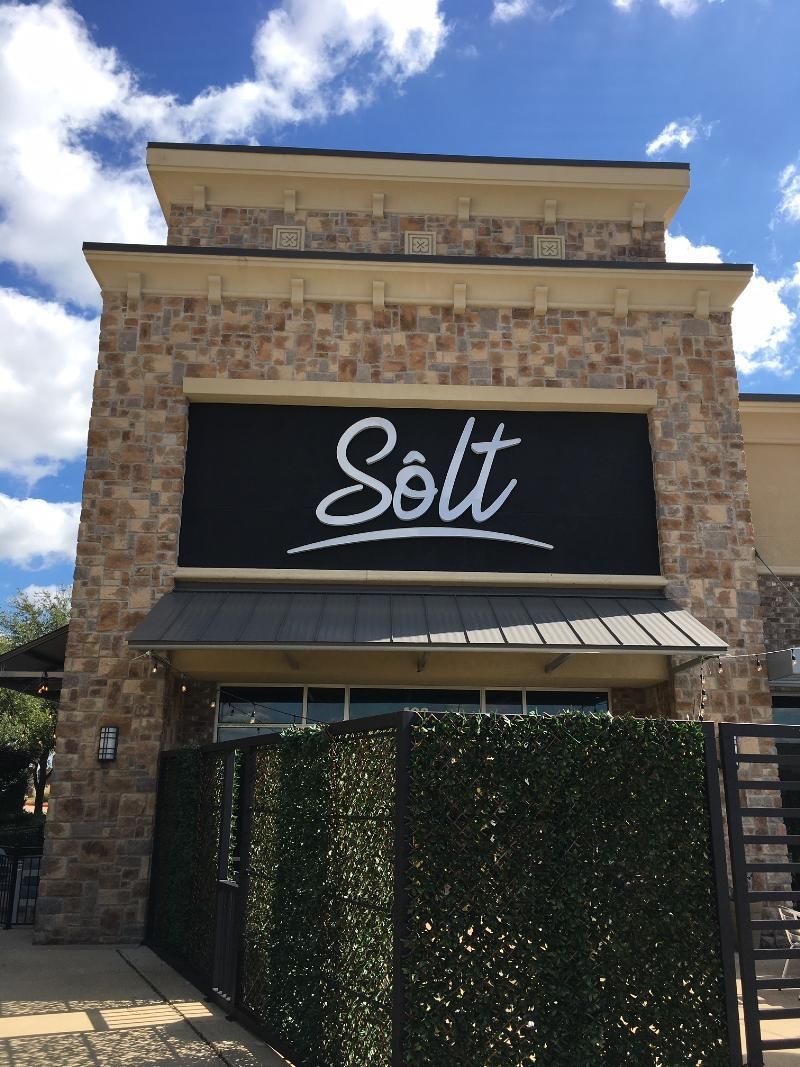 A building with a sign that says solt on it