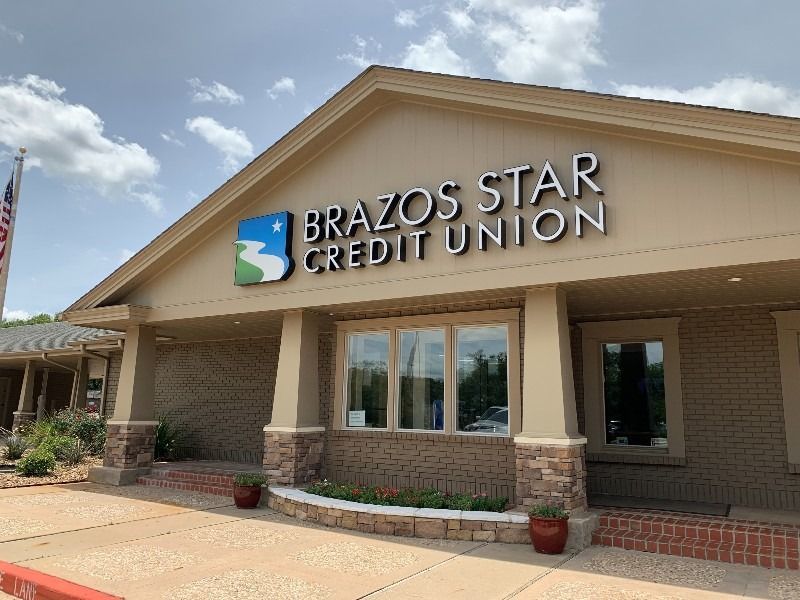 The front of a brazos star credit union building