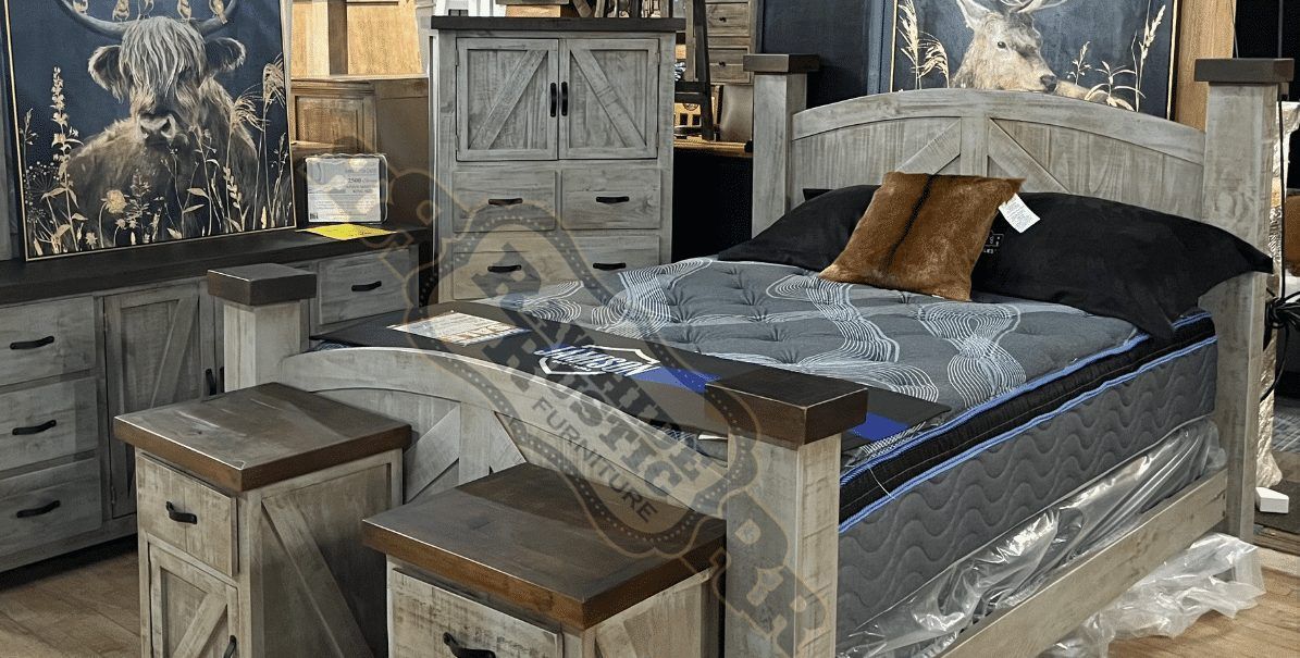 Rustic bedroom set with a bed, dresser, nightstands, and cabinet in a furniture store.