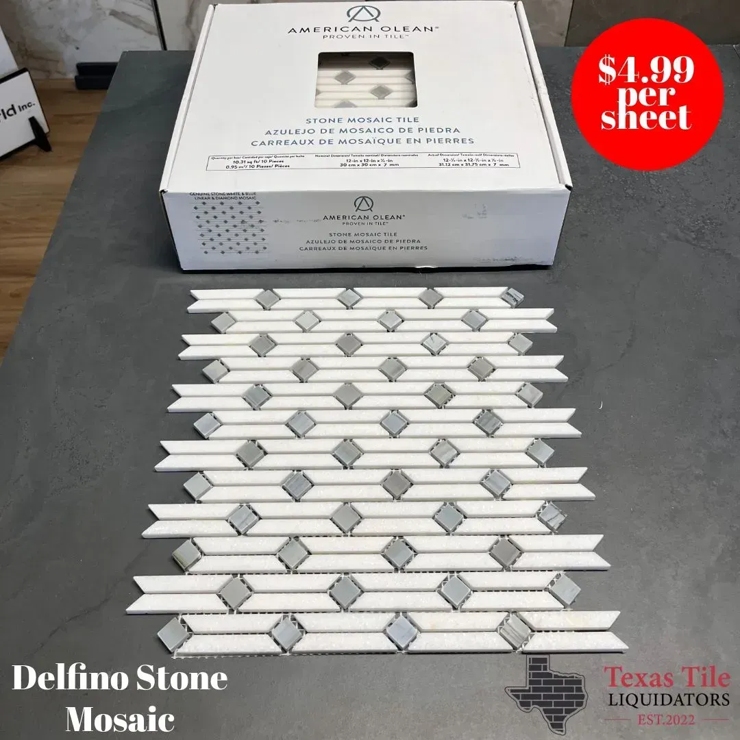 A sheet of Delfino stone mosaic tile with white and grey diamond patterns, priced at $4.99 per sheet at Texas Tile.
