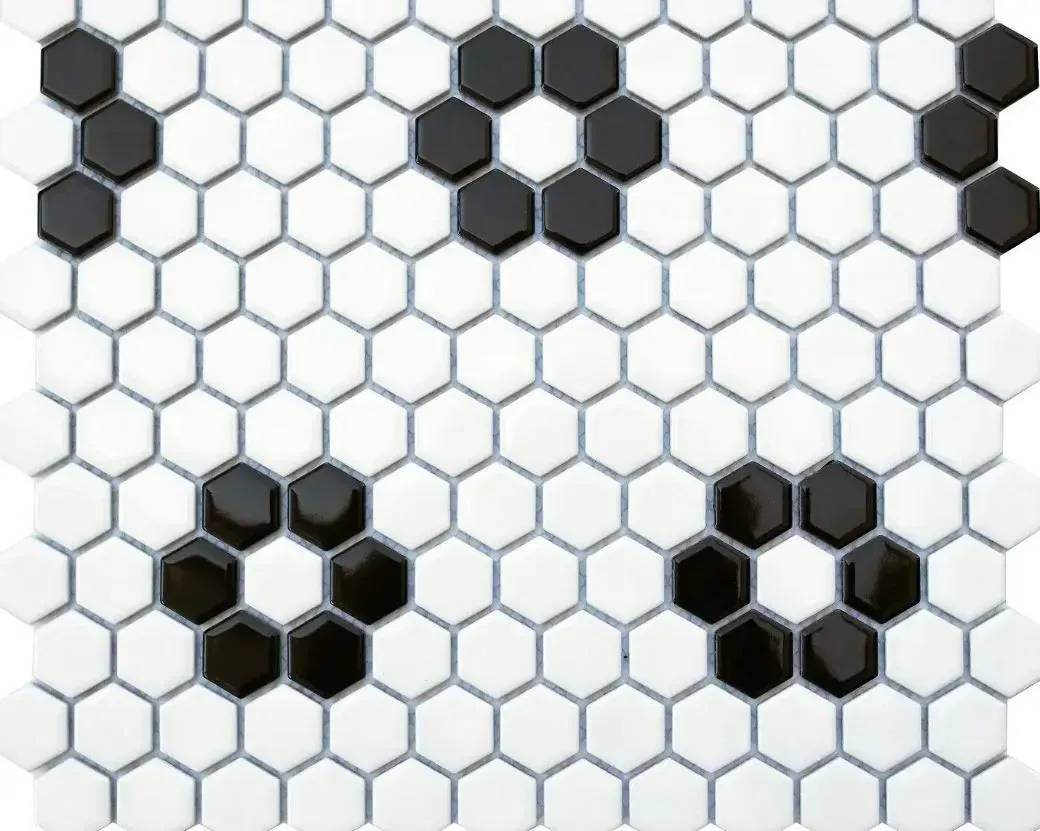 Black and white hexagonal tile pattern featuring a repeated floral design of six black tiles surrounding one white tile.