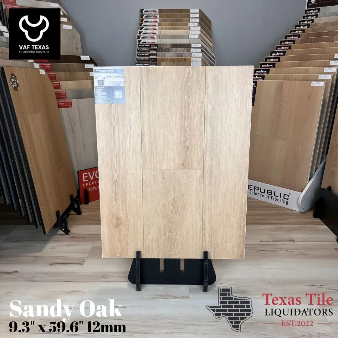 A display of Sandy Oak wood-look flooring planks at Texas Tile Liquidators, showcasing 9.3