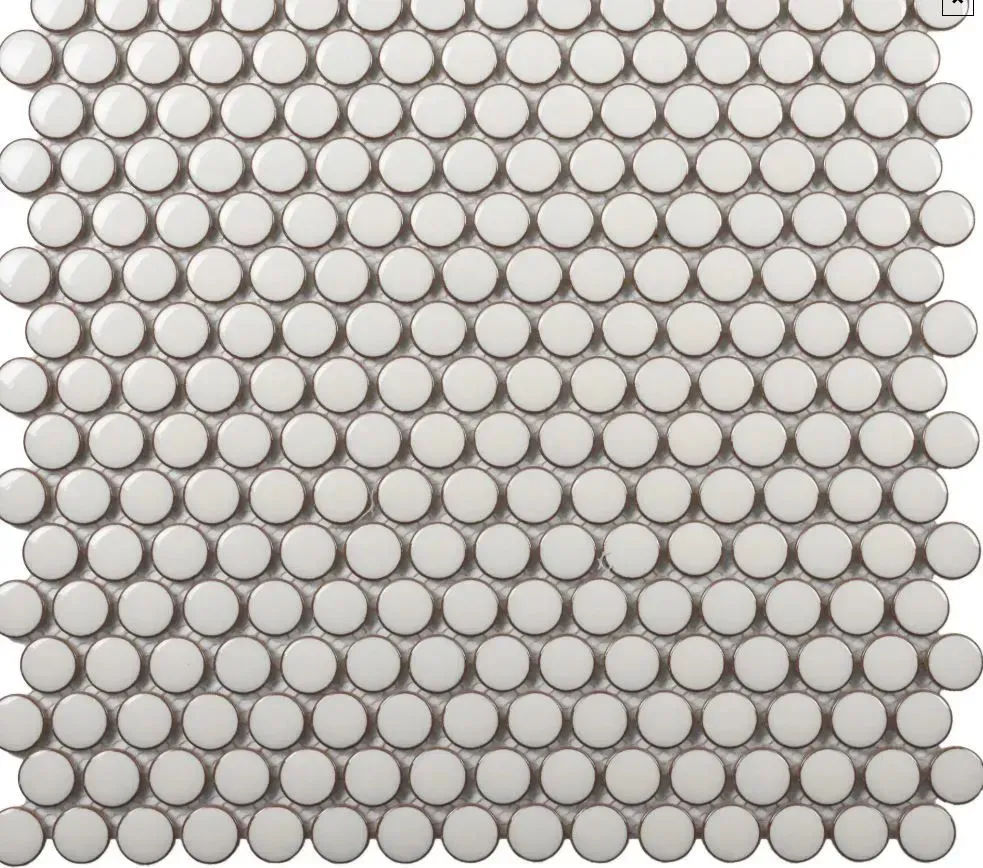 A square grid pattern of glossy, white circular mosaic tiles set against a dark grout background.