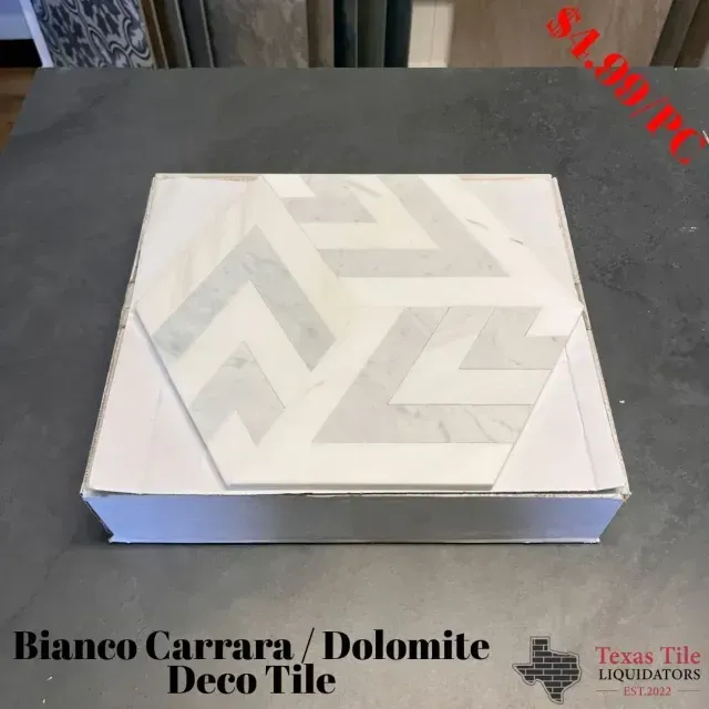 A square box containing a hexagonal Bianco Carrara and Dolomite patterned tile, with a price tag of $1.99.