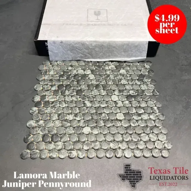 A sheet of gray, round marble penny tiles from Texas Tile Liquidators, priced at $4.99 per sheet.