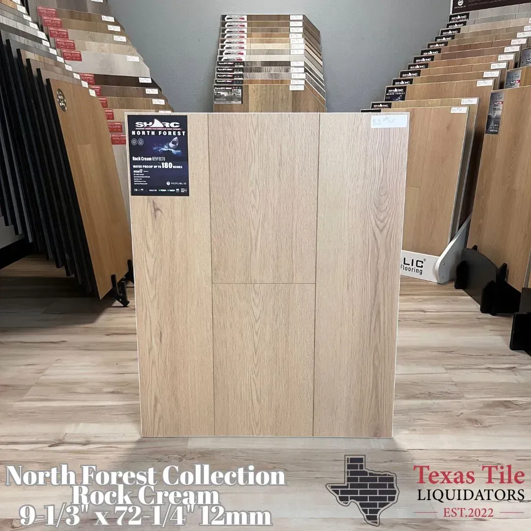 A light, wood-grain floor sample labeled Rock Cream from the North Forest Collection at Texas Tile Liquidators.