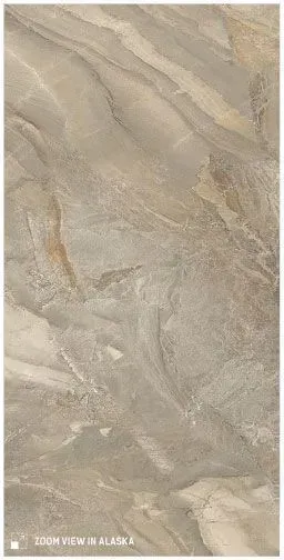 A close-up view of a large-format tile with a beige and gray marble-like pattern featuring subtle veins and textures.