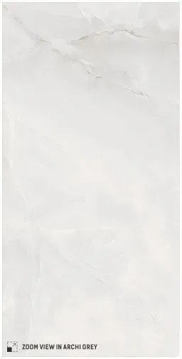 A rectangular tile featuring a soft, light-grey marble texture with faint, white veining and a polished finish.