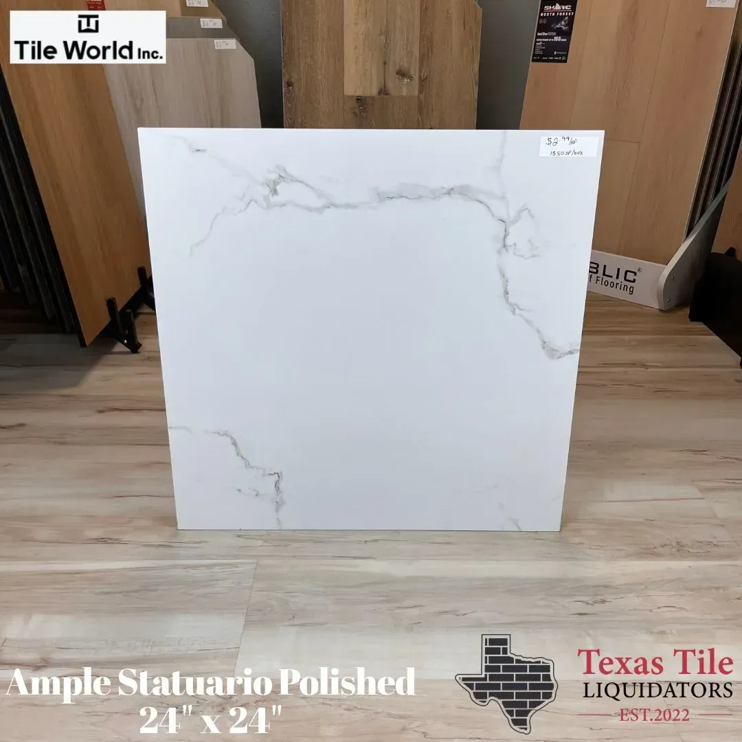 A white tile with gray veining titled Ample Statuario Polished 24x24, displayed in a store by Texas Tile Liquidators.