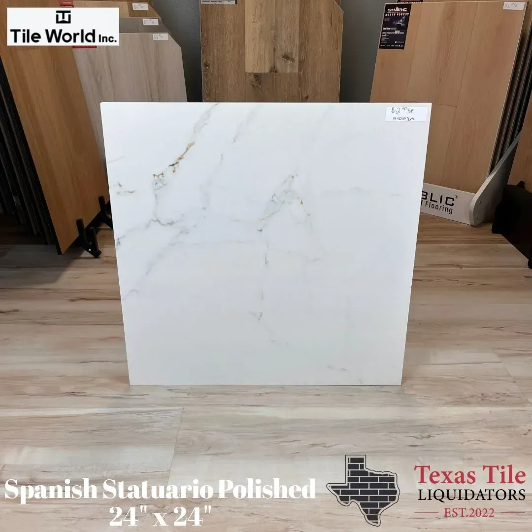 A 24x24 inch polished Spanish Statuario marble-look tile on display in a showroom.