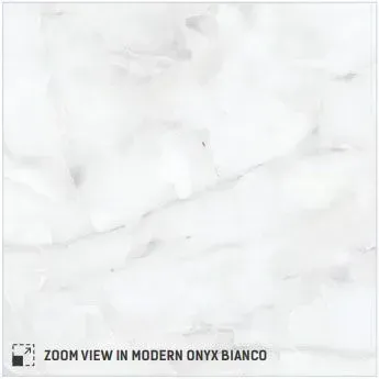 White marble-look tile surface with soft gray veining and a zoom icon labeled Modern Onyx Bianco.