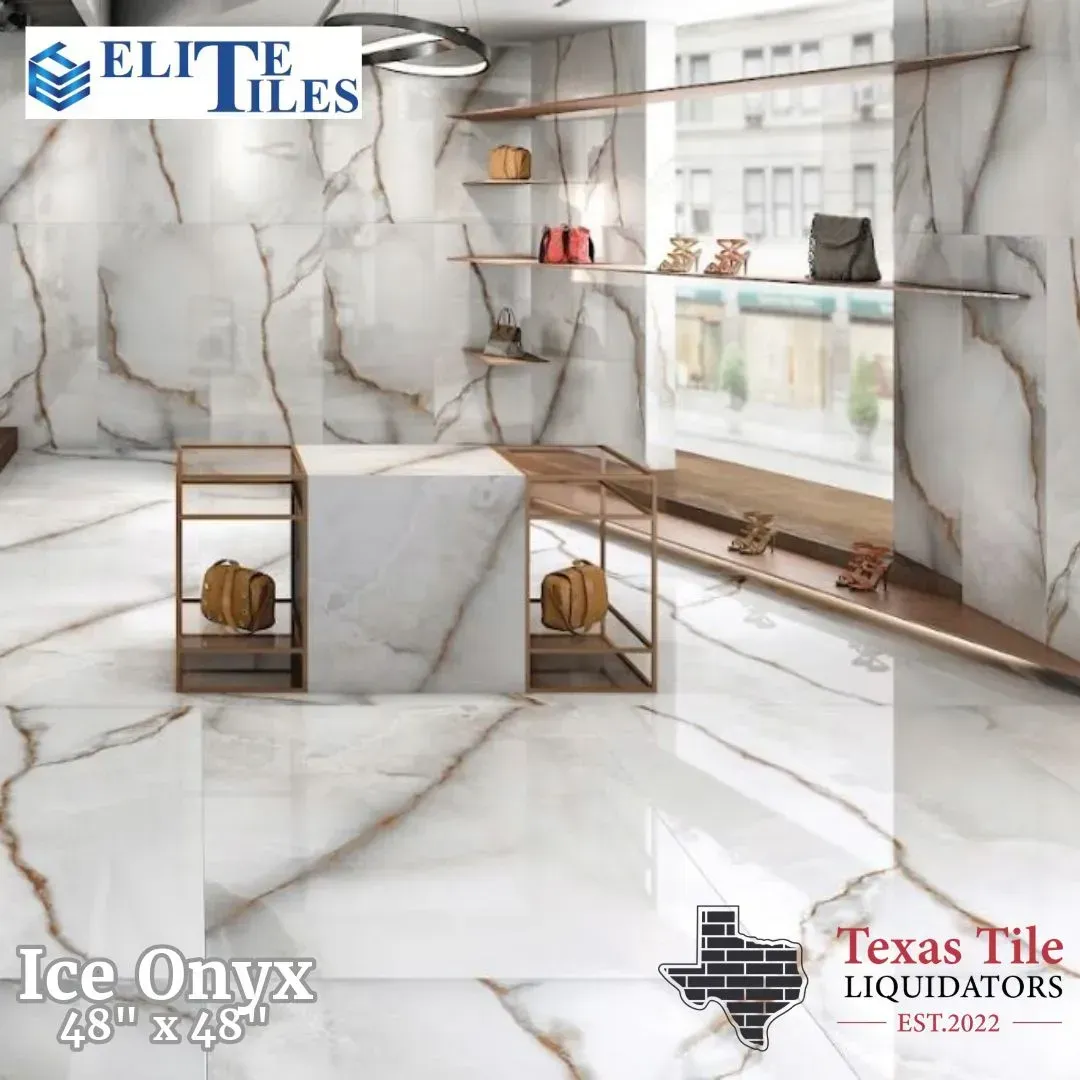 A modern retail display featuring Ice Onyx 48x48 tiles with white and gold marbling, branded by Elite Tiles and Texas Tile.