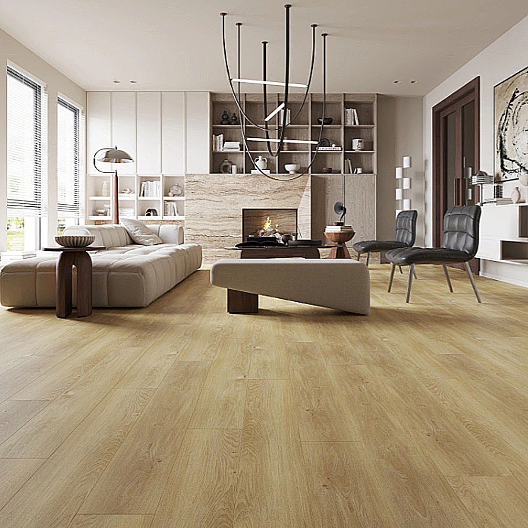 A modern living room with light wood floors, a neutral-toned sofa, two dark chairs, and a fireplace with shelving.