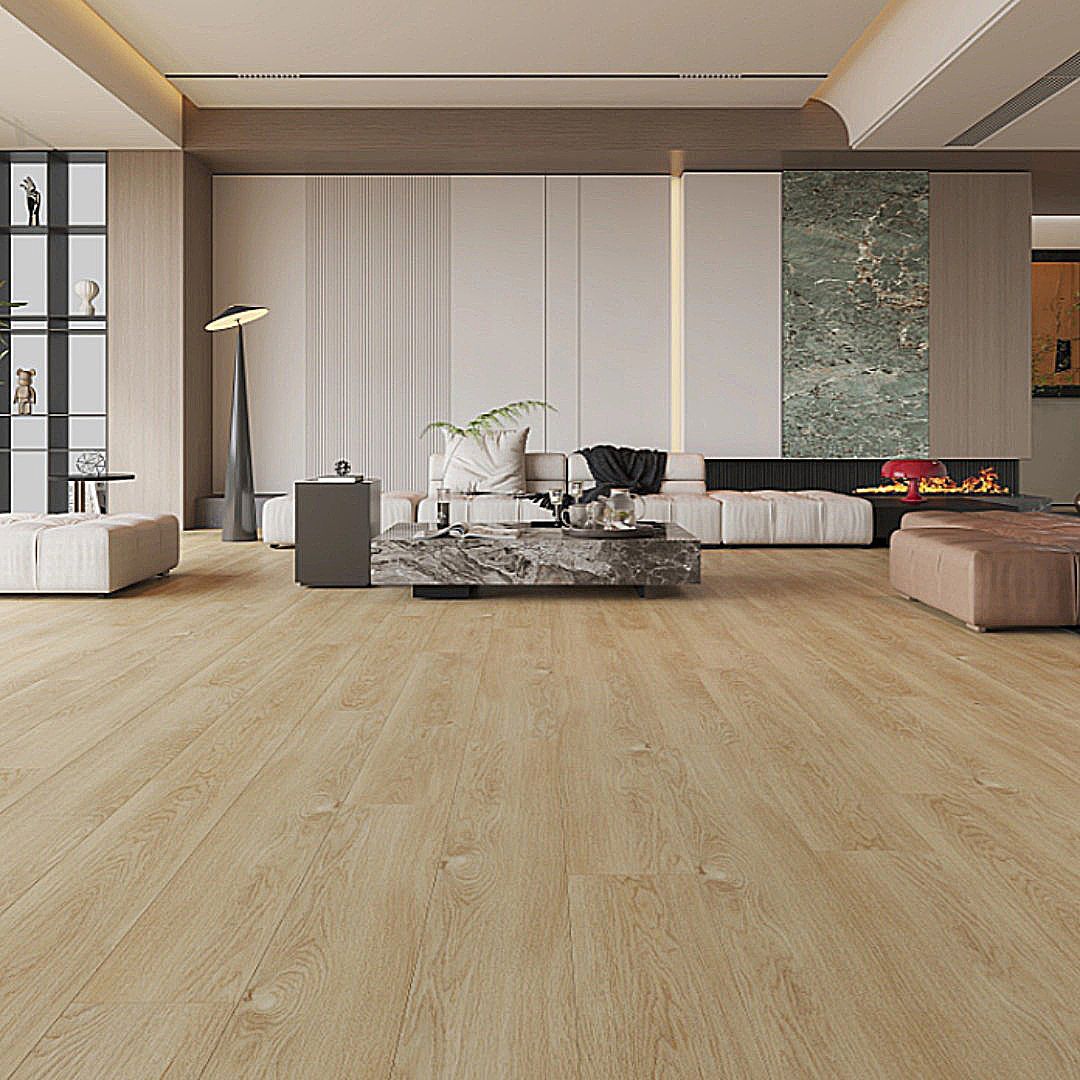 A spacious modern living room with light wood flooring, a central marble coffee table, and a contemporary fireplace.